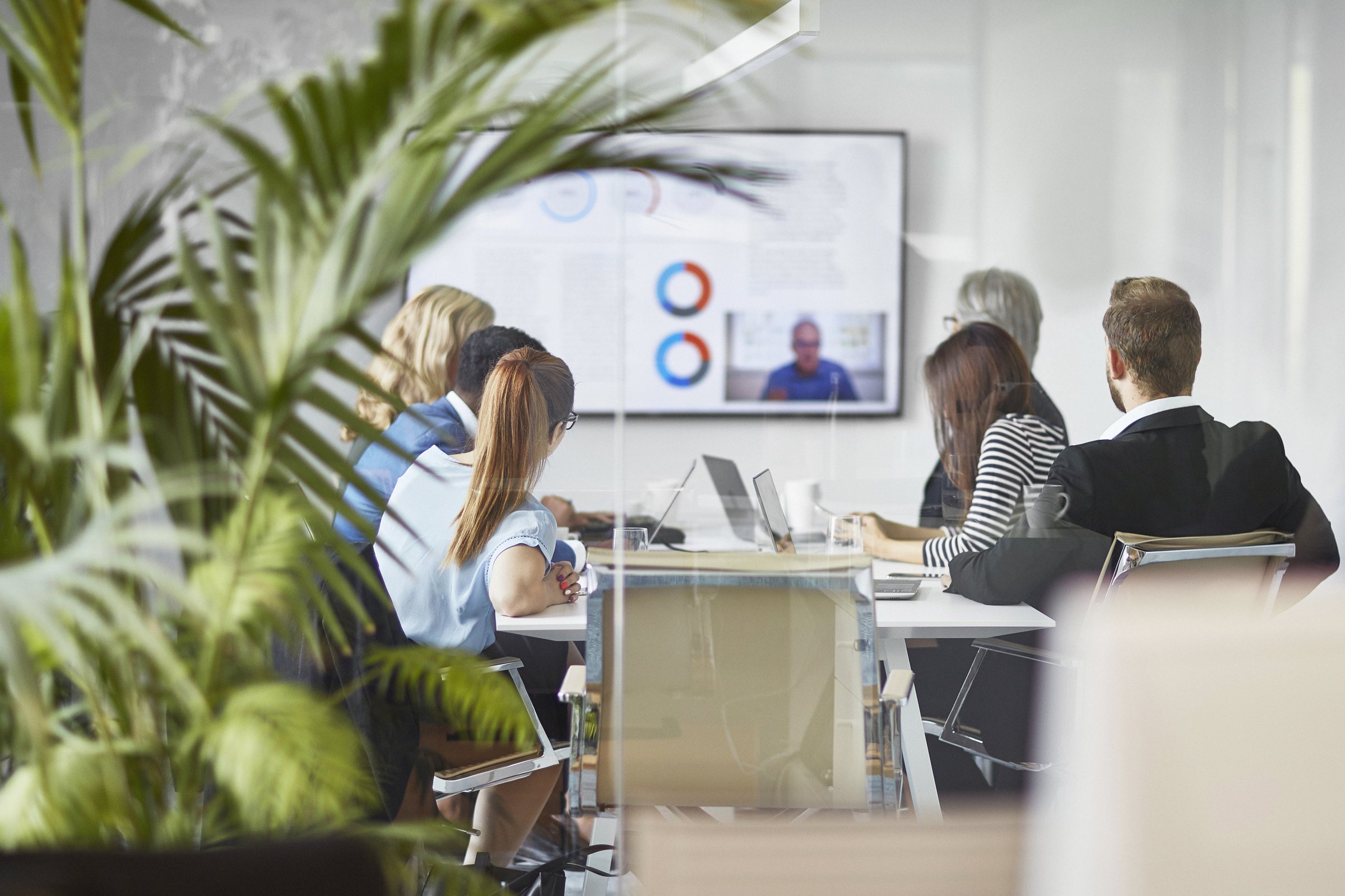 Team in a hybrid video meeting
